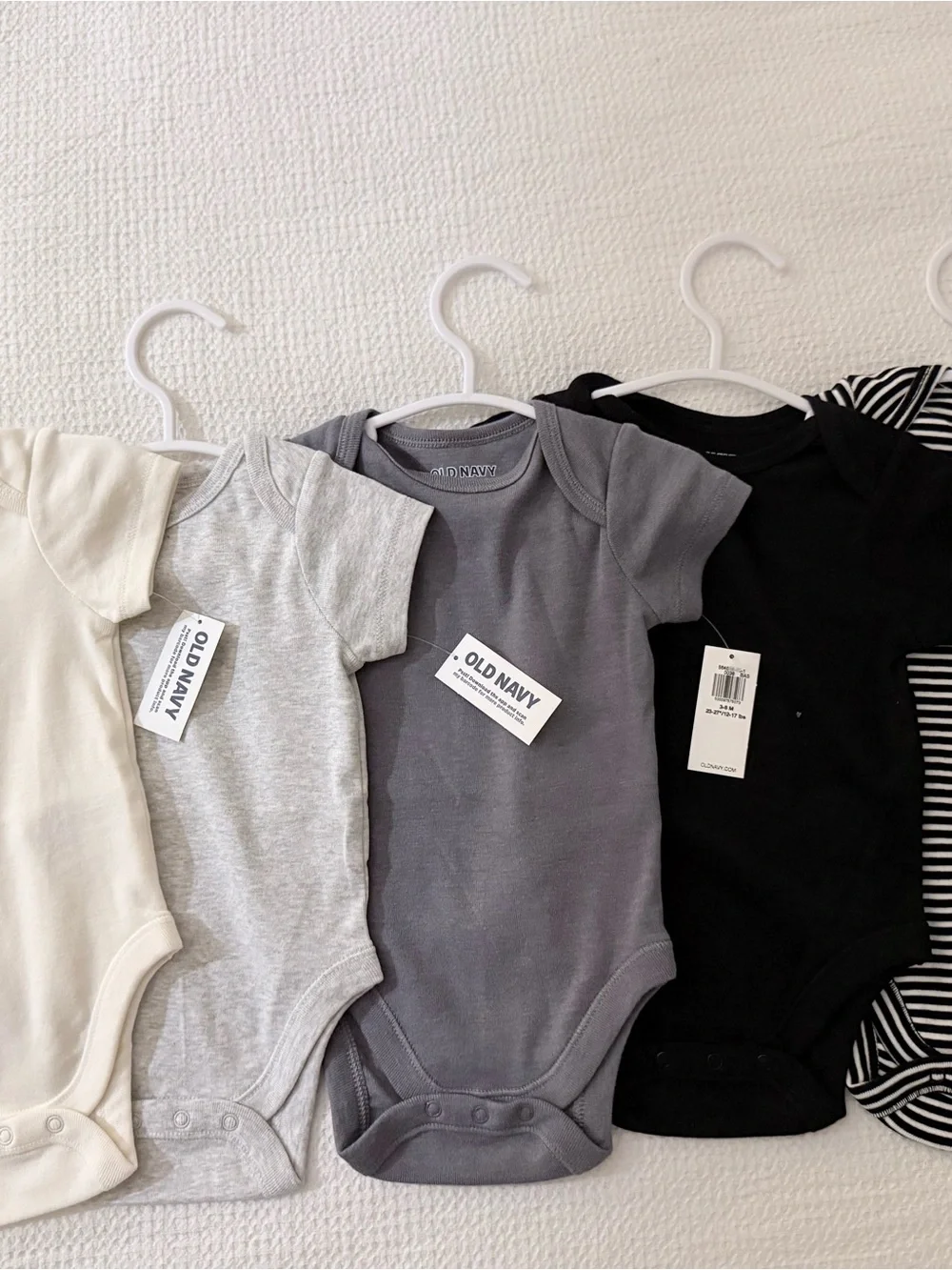 Old Navy 5-Pack Baby One-Piece Bodysuits in Cream, Light Gray, Charcoal, & Black